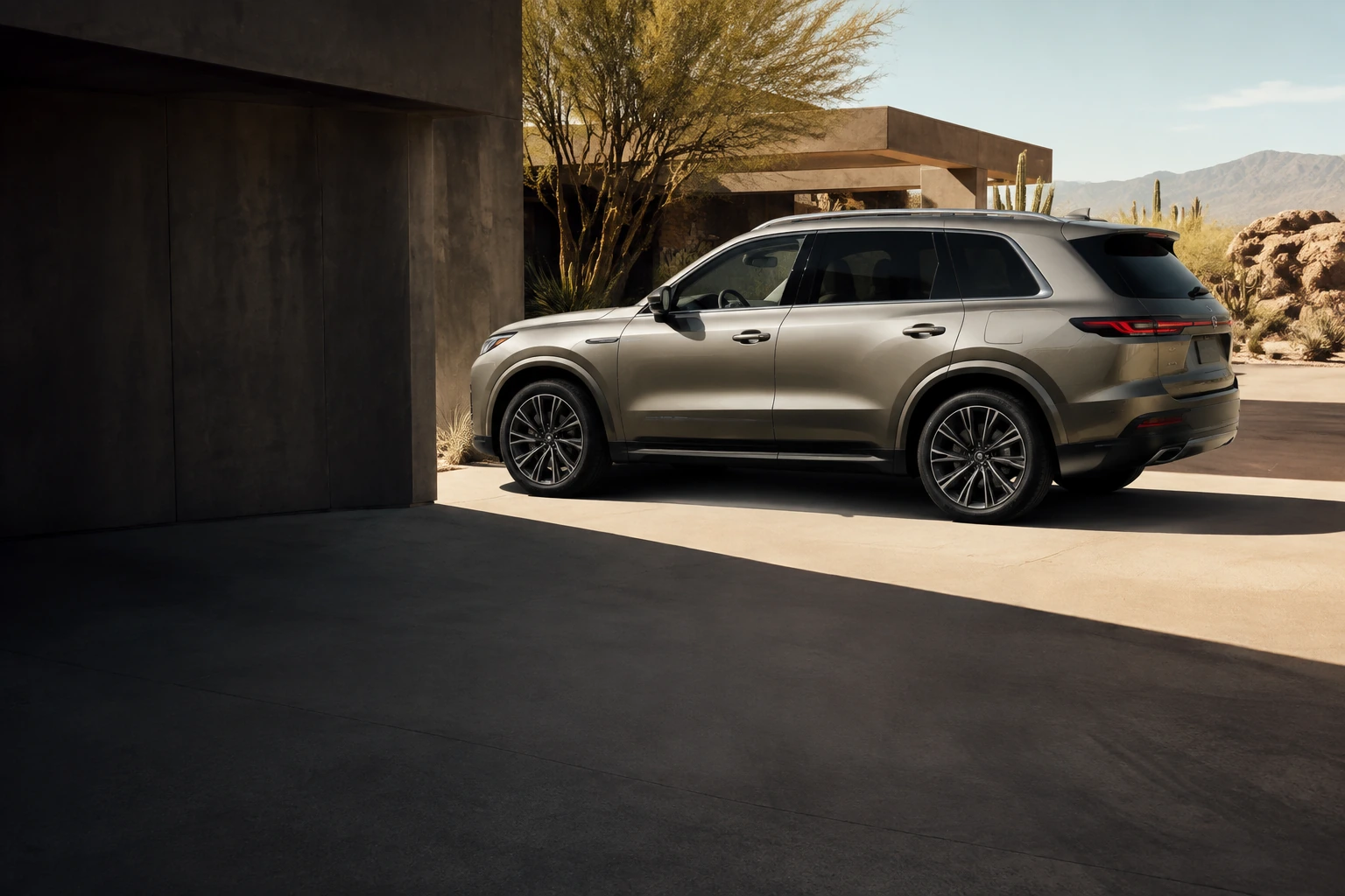 An SUV with lightly tinted side glass outside a sunlit desert home